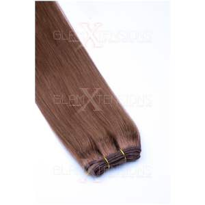 Dieses Bild zeigt die GlamXtensions Weft Extensions Haarverlängerung in der Farbe #12 Hellbraun in Großansicht. Die echthaar Tressen Extensions sind in vielen verschiedenen Farben erhältlich.
