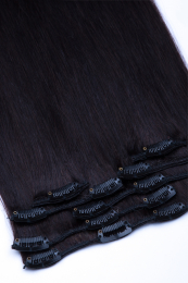 Dieses Bild zeigt die 7-teilige von GlamXtensions  zum Clip In Extension Haarverlängerung aus Remy Echthaaren mit 16 Clips in der Farbe  #1b Naturschwarz in Großansicht 