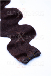 Dieses Bild zeigt die GlamXtensions Weft Extensions Haarverlängerung in der Farbe #04 Schokobraun in Großansicht. Die echthaar Tressen Extensions sind in vielen verschiedenen Farben erhältlich.
