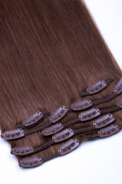 Dieses Bild zeigt die 7-teilige von GlamXtensions  zum Clip In Extension Haarverlängerung aus Remy Echthaaren mit 16 Clips in der Farbe #06 Hellbraun in Großansicht 