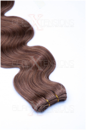 Dieses Bild zeigt die GlamXtensions Weft Extensions Haarverlängerung in der Farbe #12 Hellbraun in Großansicht. Die echthaar Tressen Extensions sind in vielen verschiedenen Farben erhältlich.
