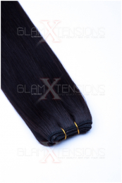 Dieses Bild zeigt die GlamXtensions Weft Extensions Haarverlängerung in der Farbe #1b Naturschwarz in Großansicht. Die echthaar Tressen Extensions sind in vielen verschiedenen Farben erhältlich.
